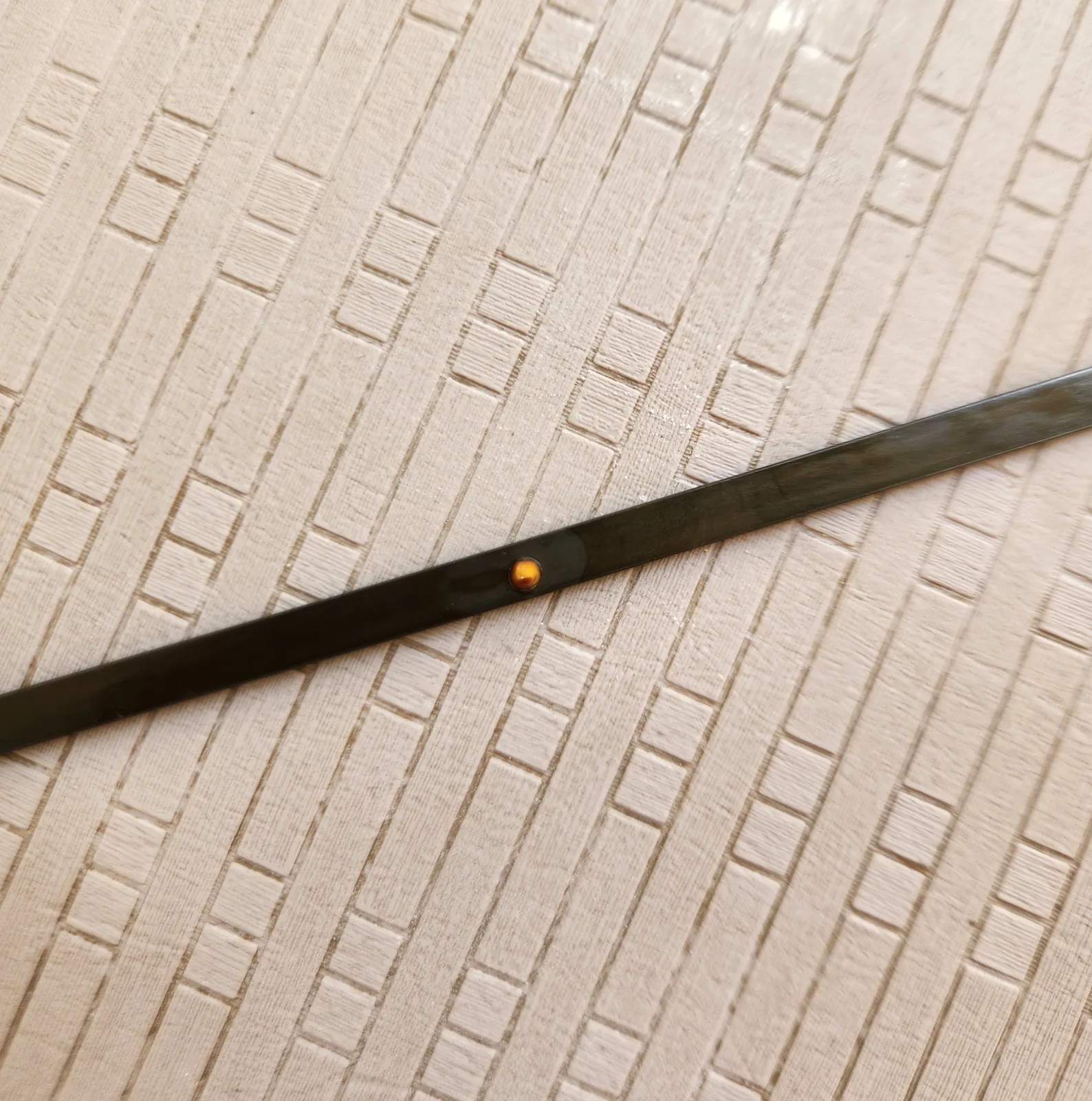 Broken engine oil dipstick in engine bay