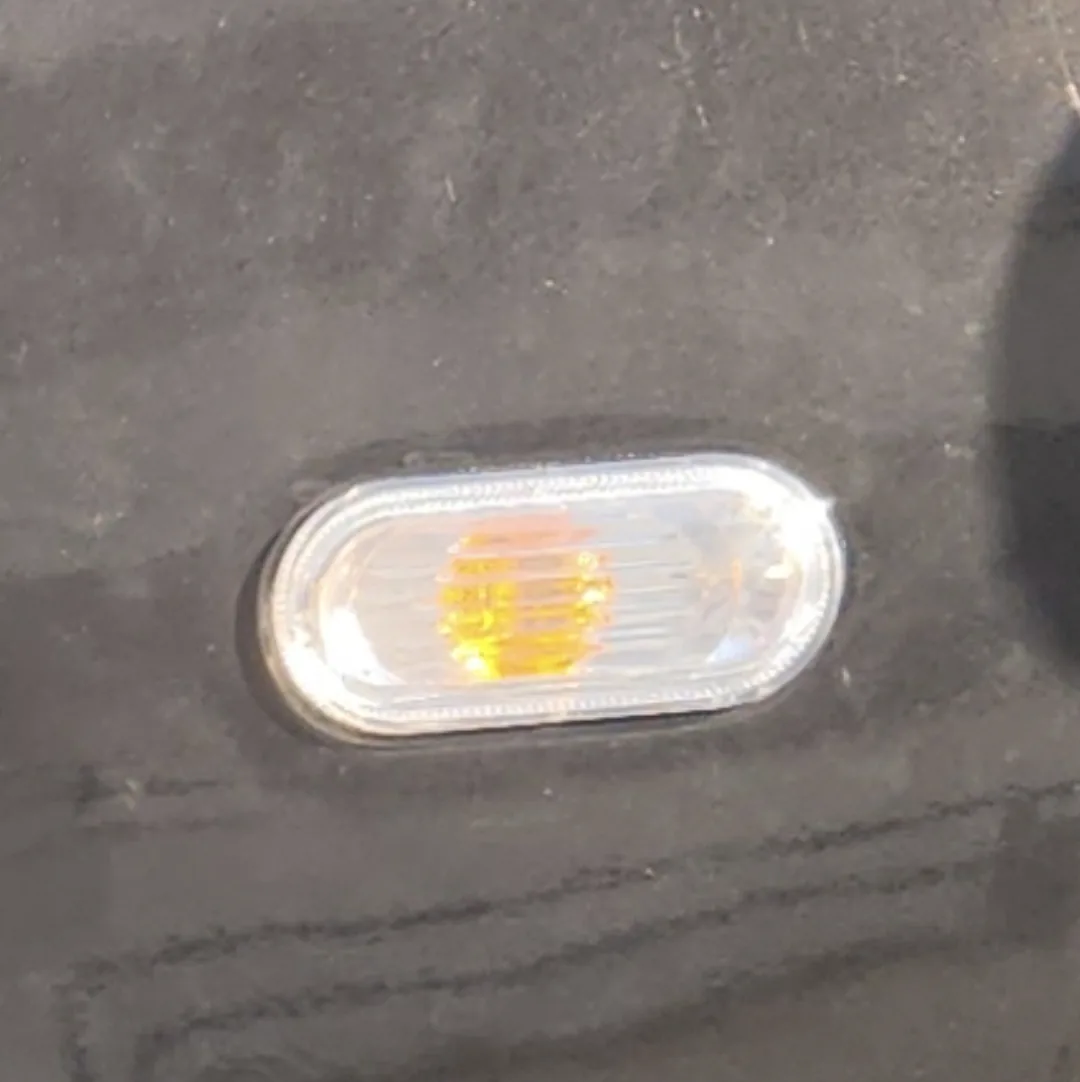 Replacement of the left fender signal housing and socket.
